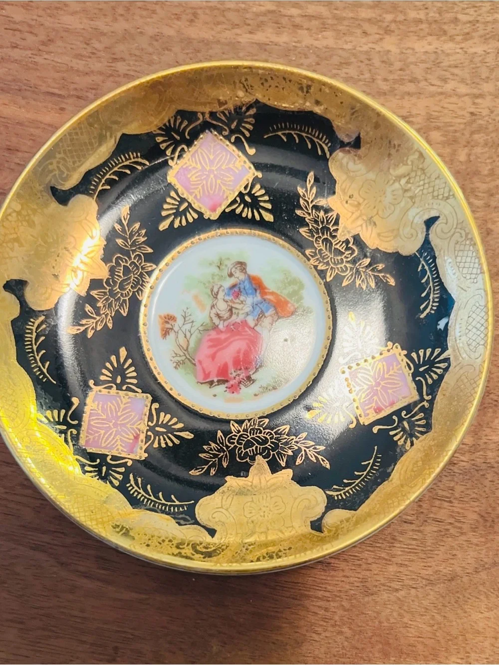 Decorative Black and Gold Porcelain Dish with Romantic Center Scene